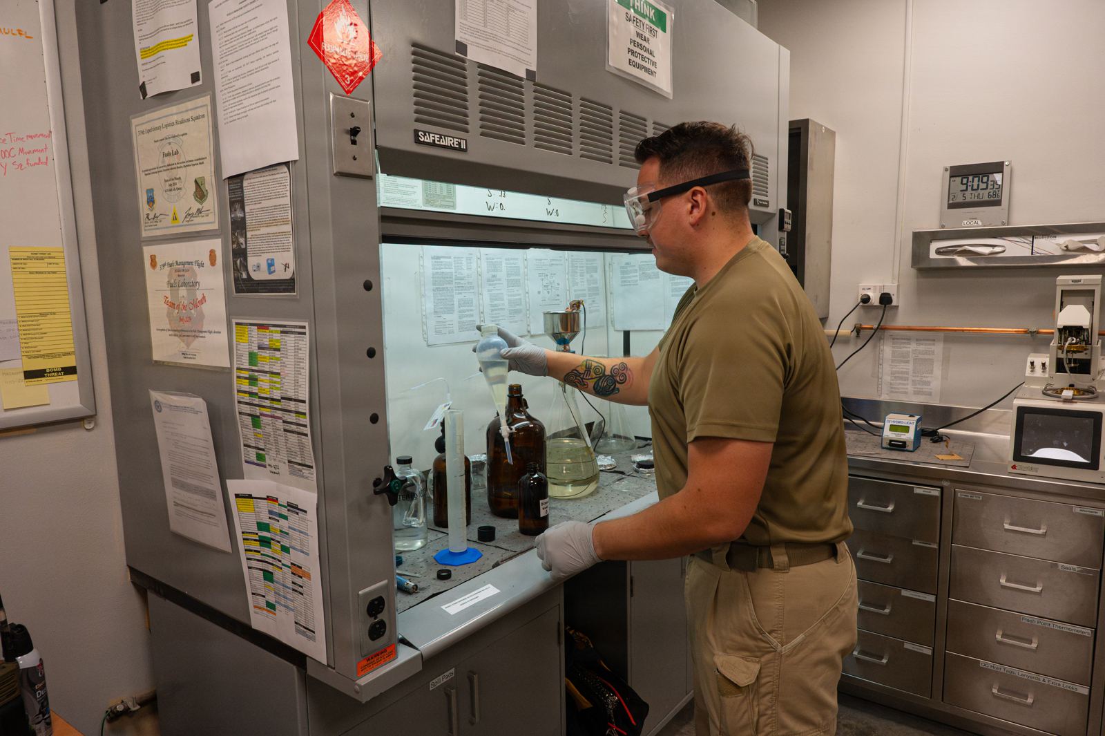 Laboratory technician testing a fuel sample
