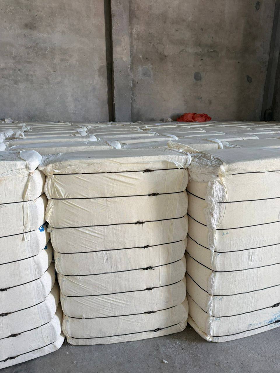 Noor Al-Faroq cotton operations — pressed bales and loading