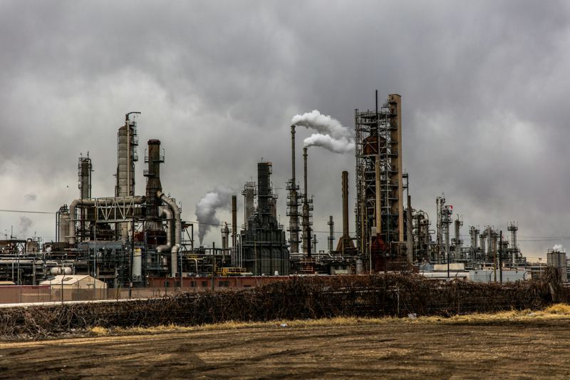 Refinery towers at dusk